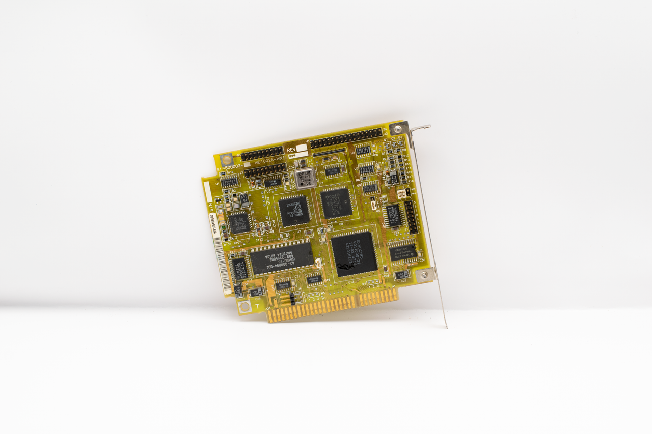 about-02 Antique circuit board showcasing vintage computing technology, isolated on a white background.
